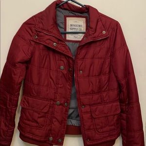 Red puffer jacket